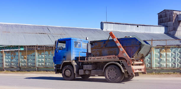 specialized car removes waste garbage from the streets of the city